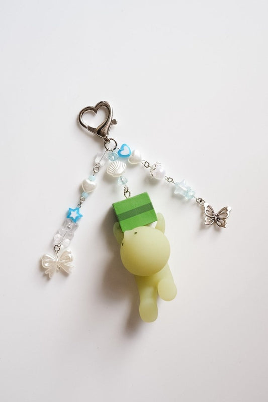 Falling Smiski Keychain