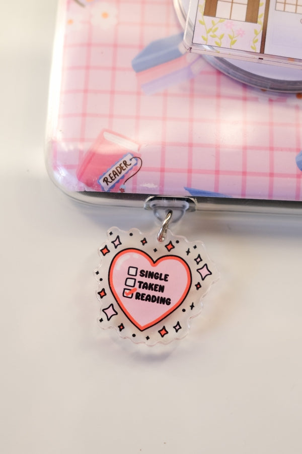 Single Taken Reading Kindle/Kobo Charm