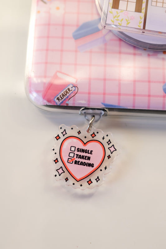Single Taken Reading Kindle/Kobo Charm
